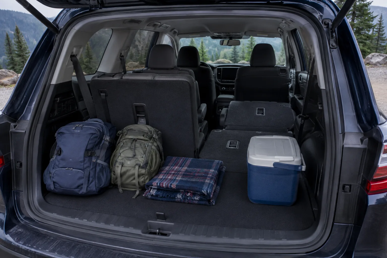 Flexible three-row SUV cargo layout with one rear seat folded